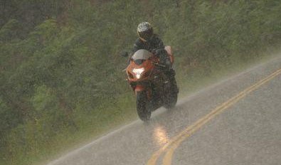 Riding in the rain - My friend riding her Gsxr in the rain at Deal's Gap