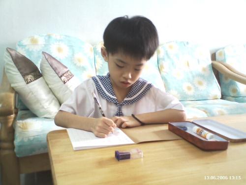 Doing Homework - My nephew doing his kindergarten homework using pencil not computer ;-)