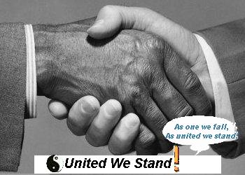United We Stand,Divided We Fall! - This is a picture of a white hand and a color hand done in black and white and grays and they are shaking hands And it has the words united we stand on it and a peace sign.