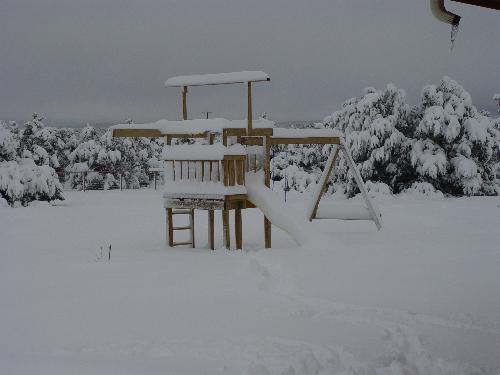 Peaceful it lies - snow covering the ground like a white blanket.