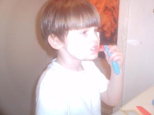 Malachai loves to shave - He has his own little plastic razor and shaving cream/soap.  He does it every day.