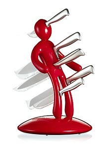 unique knife holder - a knife holder shaped like a person with the knives being held going through the person