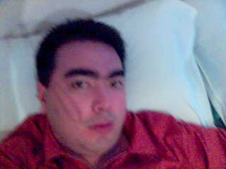 Hongkong trip - I'm lying down in a hotel bed in hongkong, this place is really small.  I'm here hopefully to see hongkong disneyland and shop a few gadgets here and there.