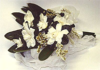 wedding flowers - gardenias and magnolia leaves