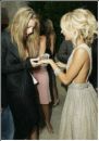 Girl Showing Her Engagement Ring - Nicole Ritchie showing her engagement ring to a friend.