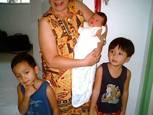 my 3 trophies! - these are my three kids, 2 boys, aged 9 and 10 and the little baby on the picture is a girl and is now 4 yrs. old. aren't they just adorable?