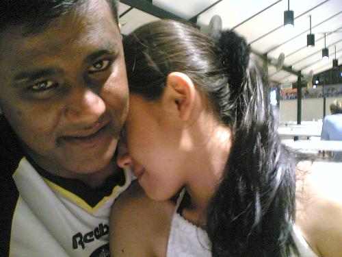 Devil + Angel - smiles.. my fav picture of babygal.. so cute.. so baby.. dun u agree? taken at newton food centre almost dawn already.. one place you all should go eat when you all come to singapore.. smiles