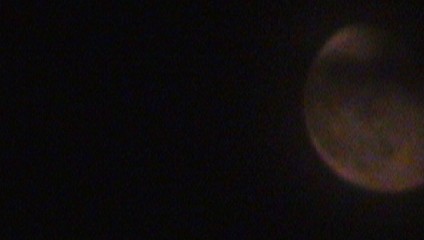 moon coming into view - moon beginning to cross my eye