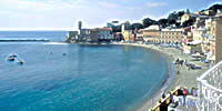 Italian Riviera: Portofino and Cinque Terre - Levante is a charming city on the Italian Riviera, nestled between the fashionable elegance of Portofino and the rugged, scenic towns of the Cinque Terre. The city overlooks a lovely, curving peninsula, with a picturesque sandy beach. The perfect location to enjoy a romantic sunset.