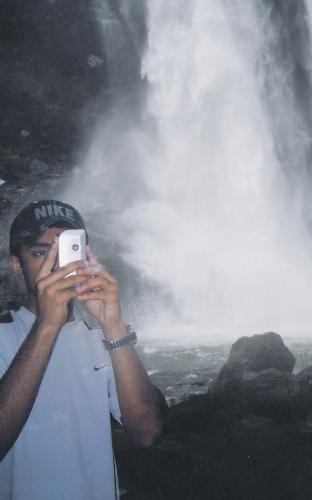 Waterfall - this is Athirapilly waterfalls in kerala ...and me in frnt of it...so hows my photographic talents???????