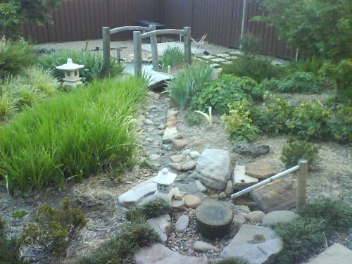 My yard - This is part of my backyard. My family loves Japanese gardens and have made one on a small scale.