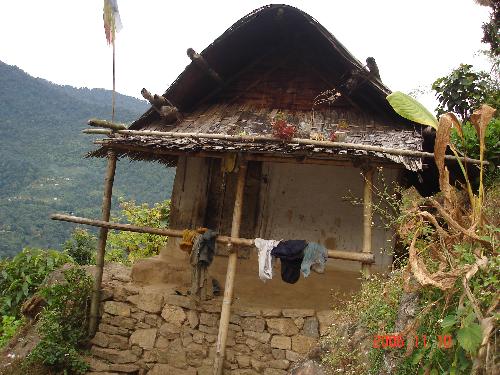 Typical village home - A typical villagers home in the country side along the Indo Bhutan border.
