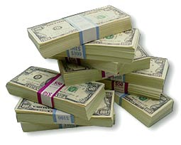 Money - Some stacks of dollar bills.