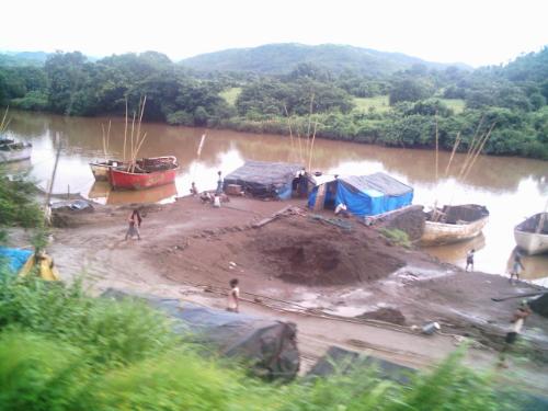 Sand  - This is the pic of a place where people are taking out sand from a small river which is use to build buildings, It is In Maharashtra, Near Bombay, India