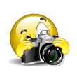 Camera - Cute image of emoticon taking a picture with a camera.