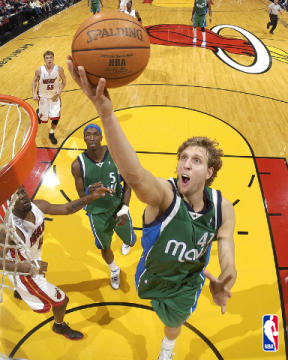 Dirk Nowitski - On his way to do the thing he does best....SCORE!
