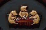 Three Pigs at Lunch - Three pigs eating a lunch togeter, sitting at the table.  http://www.bigfoto.com/miscellaneous/photos-02/