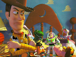 Woody and the gang from Toy Story - This is a picture from the movie Toy Story, in this particular picture, Woody is not as impressed as all the other toys are about the new toy that their owner Andy got for his birthday!