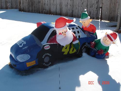 santa and elves 48 car in snow - This is our inflatable jimmie Johnson car in the snow we had.