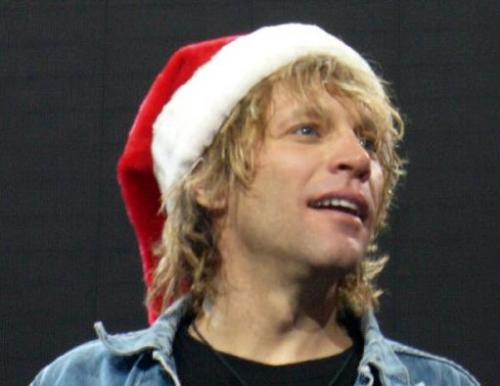 Jon Bon Jovi - Jon Bon Jovi wearing a Santa Claus hat in a live show. :)