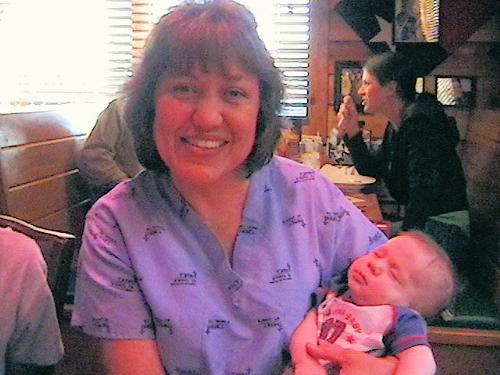 My Mama and Logan - My most favorite person in the world!! My mother!! Holding her first and only grandson.