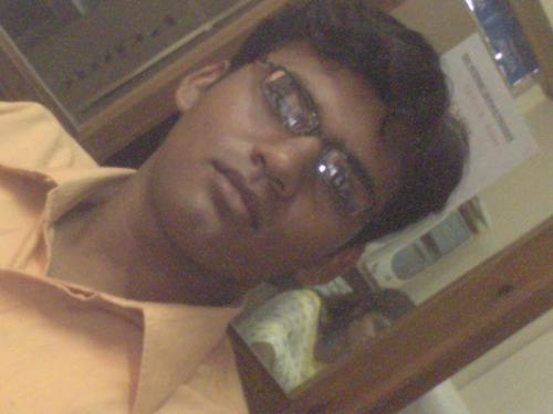 My ohoto graph -     Think i m sitting in the chair & my behind a lady..................?   what u think this is your .....................?