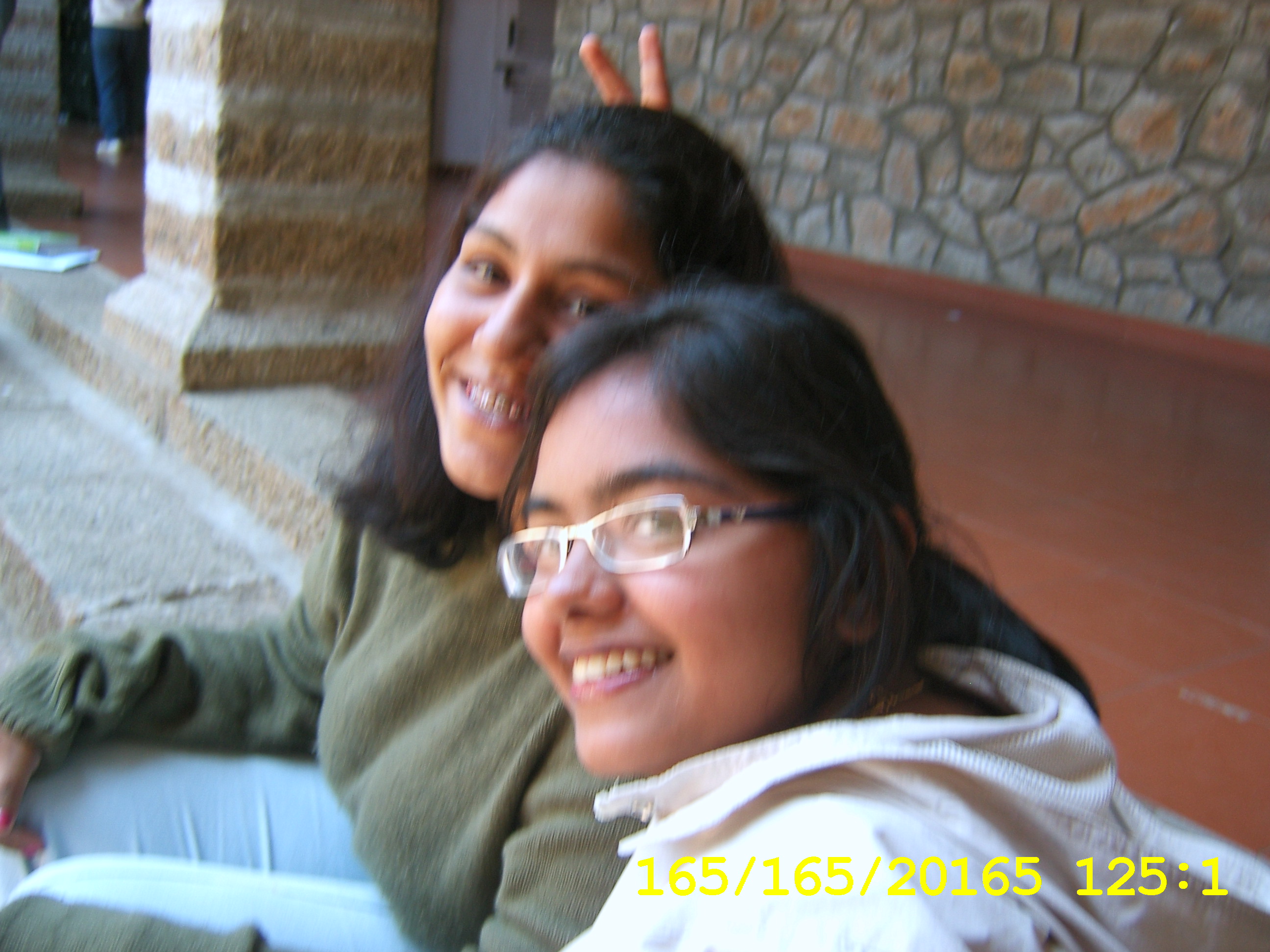 friends - these are my best friends, subha and brahmini, going spaz!!! in quad...he he wonder why?