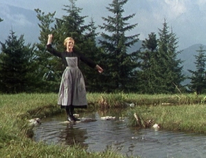 Julie Andrews in 'The Sound of Music' (1964) - This is a photo of Julie Andrews in 'Sound of Music'.The movie opens with the unforgettable song: 'The Hills are Alive with the Sound of Music'(julie andrews).  A young nun(Julie Andrews) leaves the convent in pre-Second World War Austria to serve as governess for a motherless family and finds herself falling in love with the seven children – and their father – in this classic Rodgers and Hammerstein musical that guaranteed huge stardom for Julie Andrews. THE SOUND OF MUSIC won the Academy Awards for Best Picture of 1965 and Best Director (Robert Wise.
