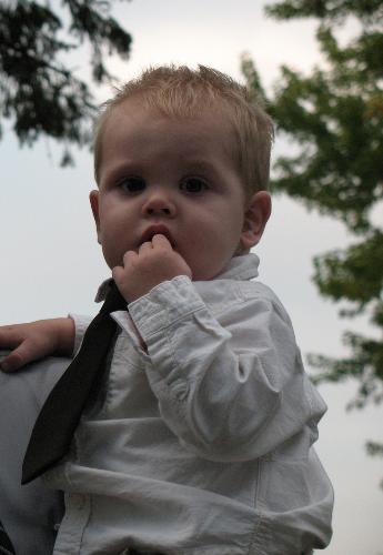 My son, Andrew. - This is a picture of my little 1 year old son.  This picture was taken at my wedding and his grandpa, Joe, is holding him.  He is my joy in my life!