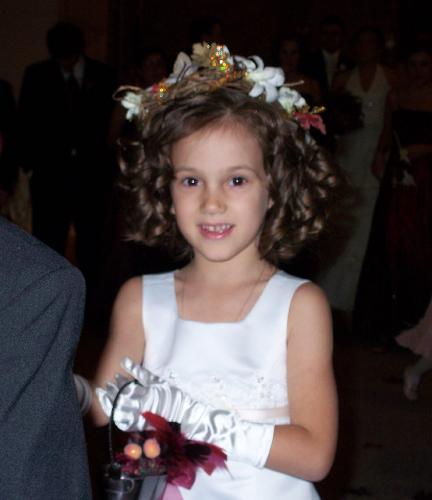 My daughter, Samantha. - Awww, here is my precious little girl, Samantha.  This photo was taken at my little sister's wedding.  Samantha was the little flower girl.  She is my other joy in life.