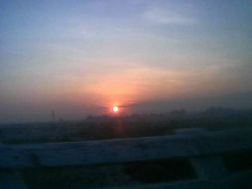 SUNRISE... - Sunrise... dawn, a refreshing scene in the morning. Symbolizes a  good start, a new hope, a bright future, a new light after a long a long night of darkness. This is the time of the day when you feel the breeze of cool air, when it is the best time of the day you feel comfortable, when you have to wake up to start a new day full of hope, when your body is refreshed, rested and full of energy...sunrise, your sight gives us smiles when I open my eyes in the morning seeing the serenity of your existence in this time of the day.