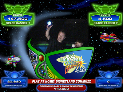 My Son And I Blasting Zurg - The Astro Blasters Ride At Disneyland.  My son, four at the time, was really only interested in this attraction.  Oh, yeah.  He liked Star Tours, too.