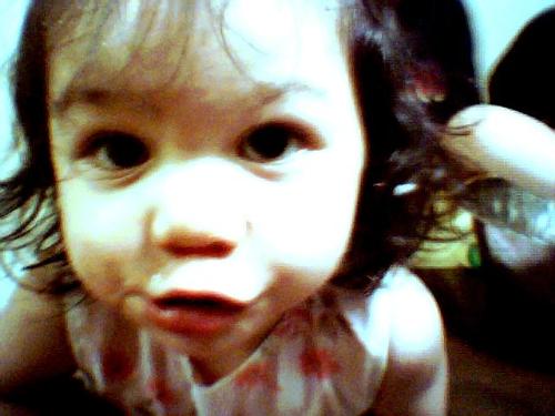 Araceli saying 'cheese' - My daughter saying 'cheese' in the camera