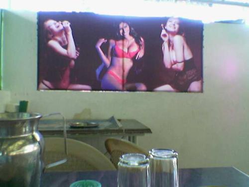 Photos in a mess - These r displayed posters in a restaurant
