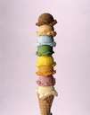 Icecream Tower - A tower of different flavored icecream on a cone