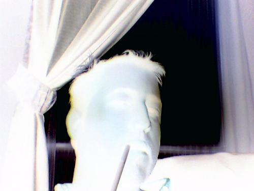 This is me....in the negative! - just me messin' around with my camera phone...yeah! that's a cigarette....