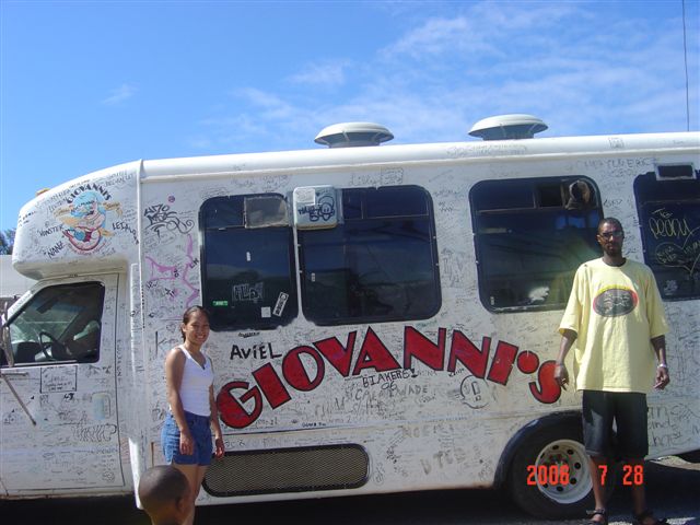 The best shrimp place on the island. - Me and my hubby at Giovanni's shrimp shack.  It is the best on the island.