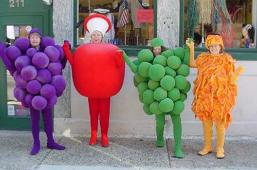 Fruit of the loom. - Two grape clusters, a fig leaf and an apple.