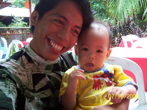 me and baby jiro - a picture of me and my friend's baby boy.