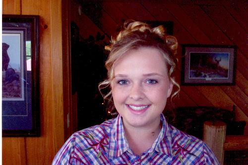 Oh the Hair - This is me as a bridesmaid for my friend's wedding last year.  The hair kills me.  It just wasn't me.  I'm not into curls.  Anyways, the wedding was at this huge lodge and it was absolutely beautiful.  Sad to say my friend is already divorced. :(