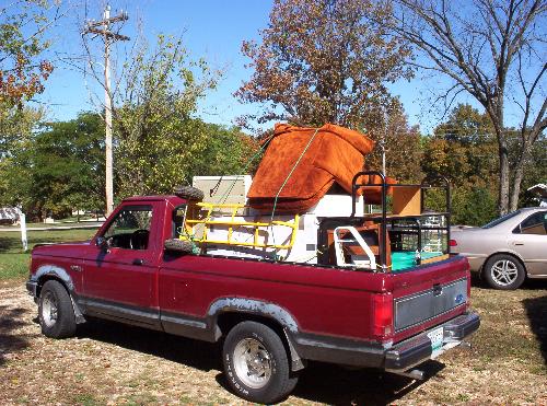 White Trash Movers - We couldn't afford a moving truck so we offered lunch to a friend and this is what we got.  I seriously thought that orange chair was going to fall off and I hoped it would.  No luck.