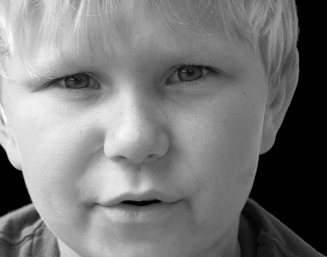 Photoshopped Black and White - I took this in color but changed it to black and white.  I used the burn tool to change some of the lighting and take out the background.