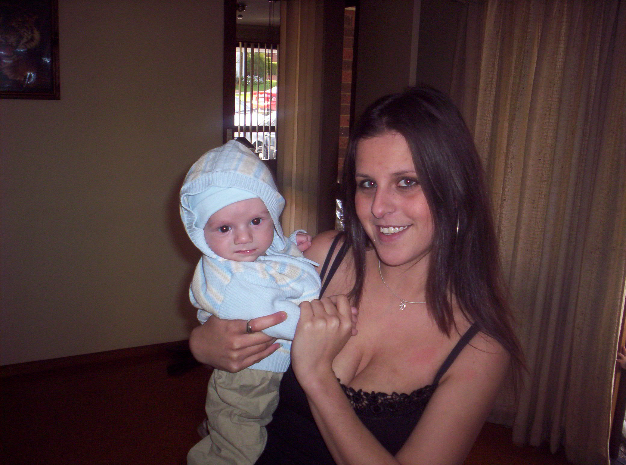 Kai Douglas and I - I love my beautiful son, in this picture he looks like a teletubbie, lol... This picture was taken on my 21st birthday. I cherish every moment I spend with my spunky son, and I know I am so lucky to have such a beautiful and sweet little boy.