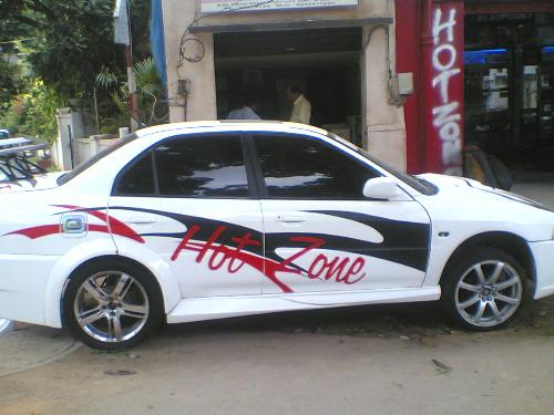 My car - I love my car...its basically a lancer which i modified and spent over 2lakhs over modifying... hope you guys would like it.