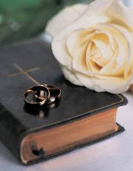 Marriage - A symbol of the Marriage Ceremony - Bible, Ring, and flower