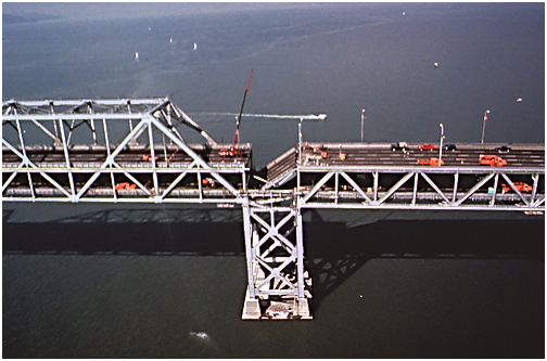 Bay Bridge 1989 - 'This span of the Bay Bridge between San Francisco and Oakland, California, collapsed during the magnitude 7.0 Loma Prieta earthquake on Oct. 17, 1989, which struck just before the first game of the World Series was to be played at San Francisco's Candlestick Park. Although its epicenter was about 100 km south of San Francisco, the Loma Prieta earthquake caused considerable damage in the city and killed 63 people. East-west ground shaking shifted parts of the bridge by as much as 25 cm, shearing bolts and removing support from the fallen span.'