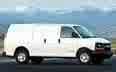 white van with black tires - a white cargo type van that can haul a variety of items and become a useful vehicle for any entire family