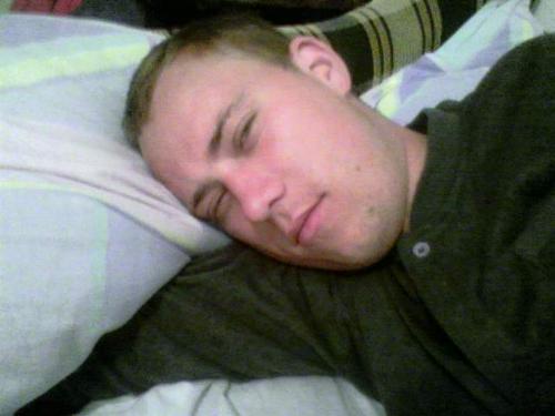 My brother - one eye open, half sleeping;)