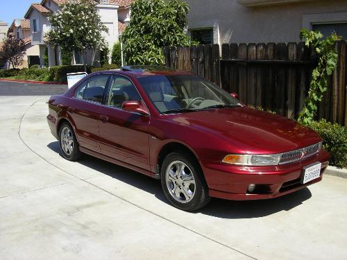 baby red - my husbands first car with me.