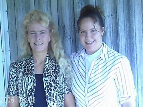 My family - This picture is my mom Pearl and my sister Jessica.They were getting ready to go to my sisters end of the year program at school.